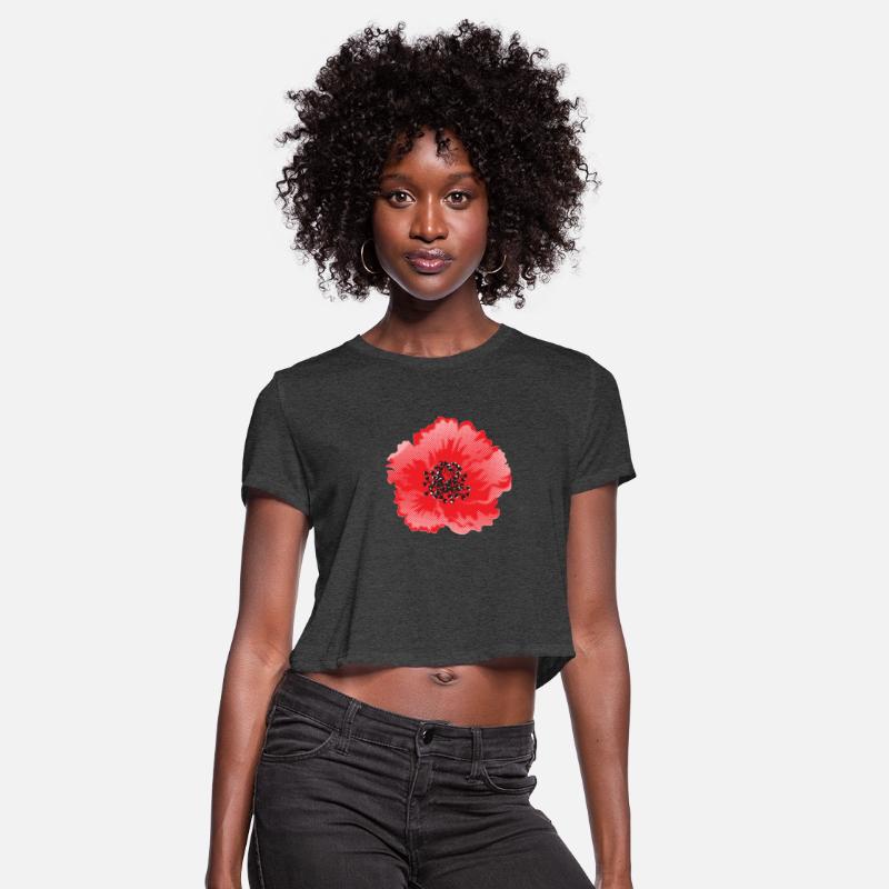 a red flower with a black center on a black