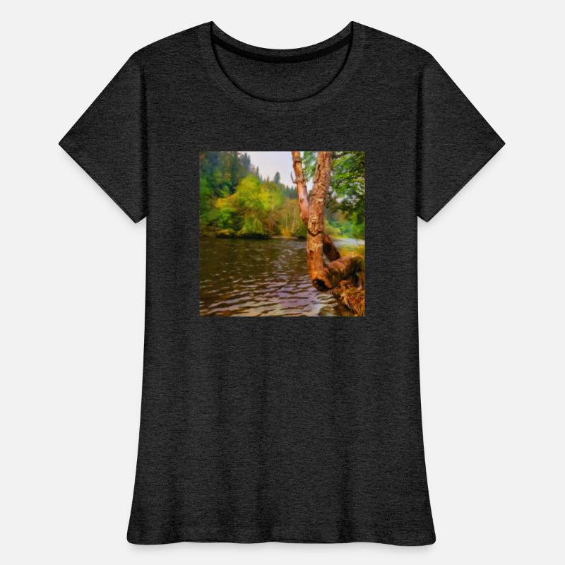 large tree growing over river bank