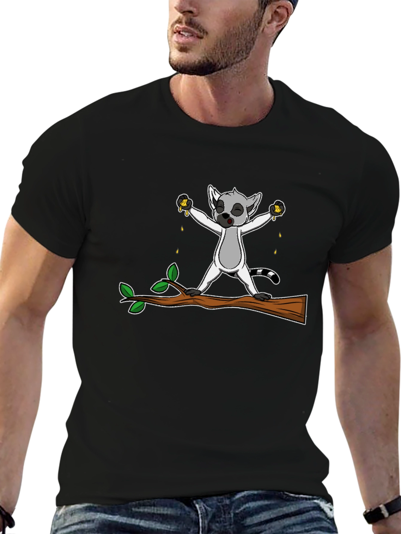 Lemur Squeezing Fruit Graphic T-Shirt